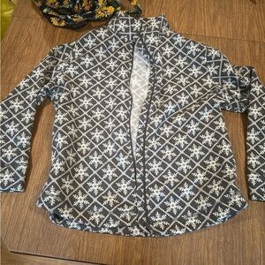 A sweater with a zipper. Brand new from Talbots, it’s a xl. With snowflakes